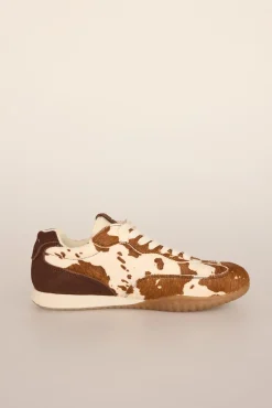 Zapatillas de piel con estampado vaca