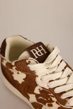 Zapatillas de piel con estampado vaca