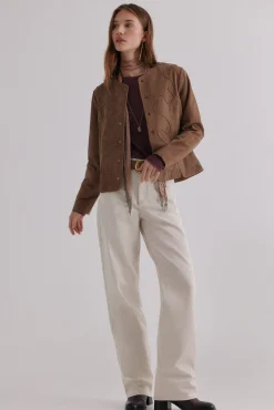 Zia. Chaqueta con tachuelas